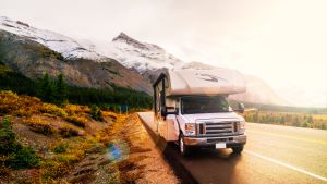 RV driving through mountains